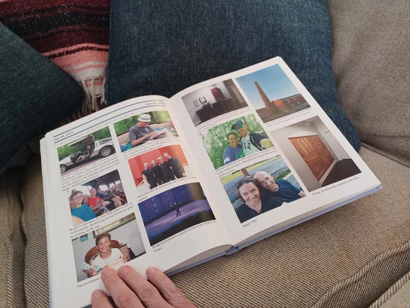Person reading a Recap book on a couch